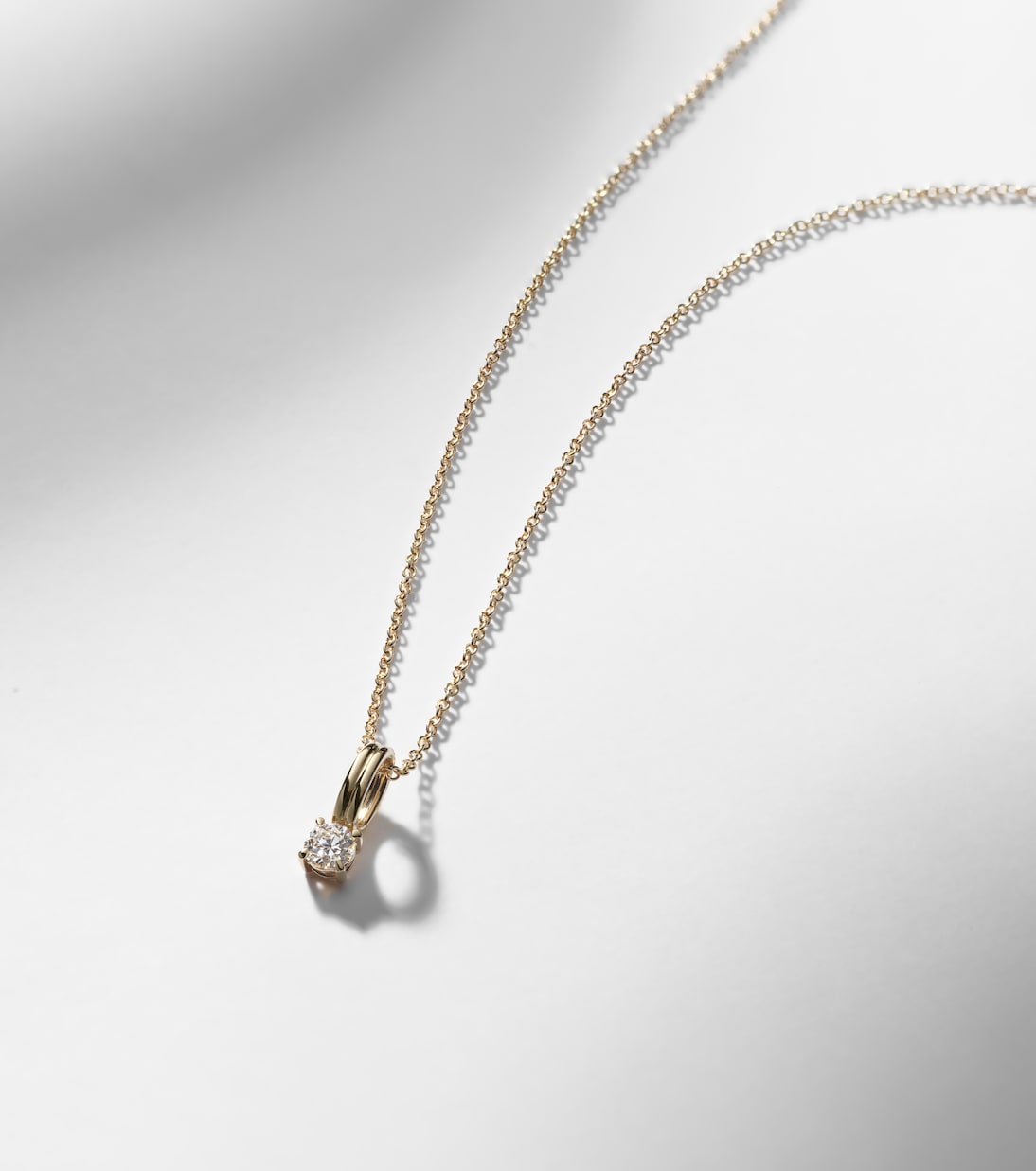14kt gold charm necklace with diamonds | Stone and Strand