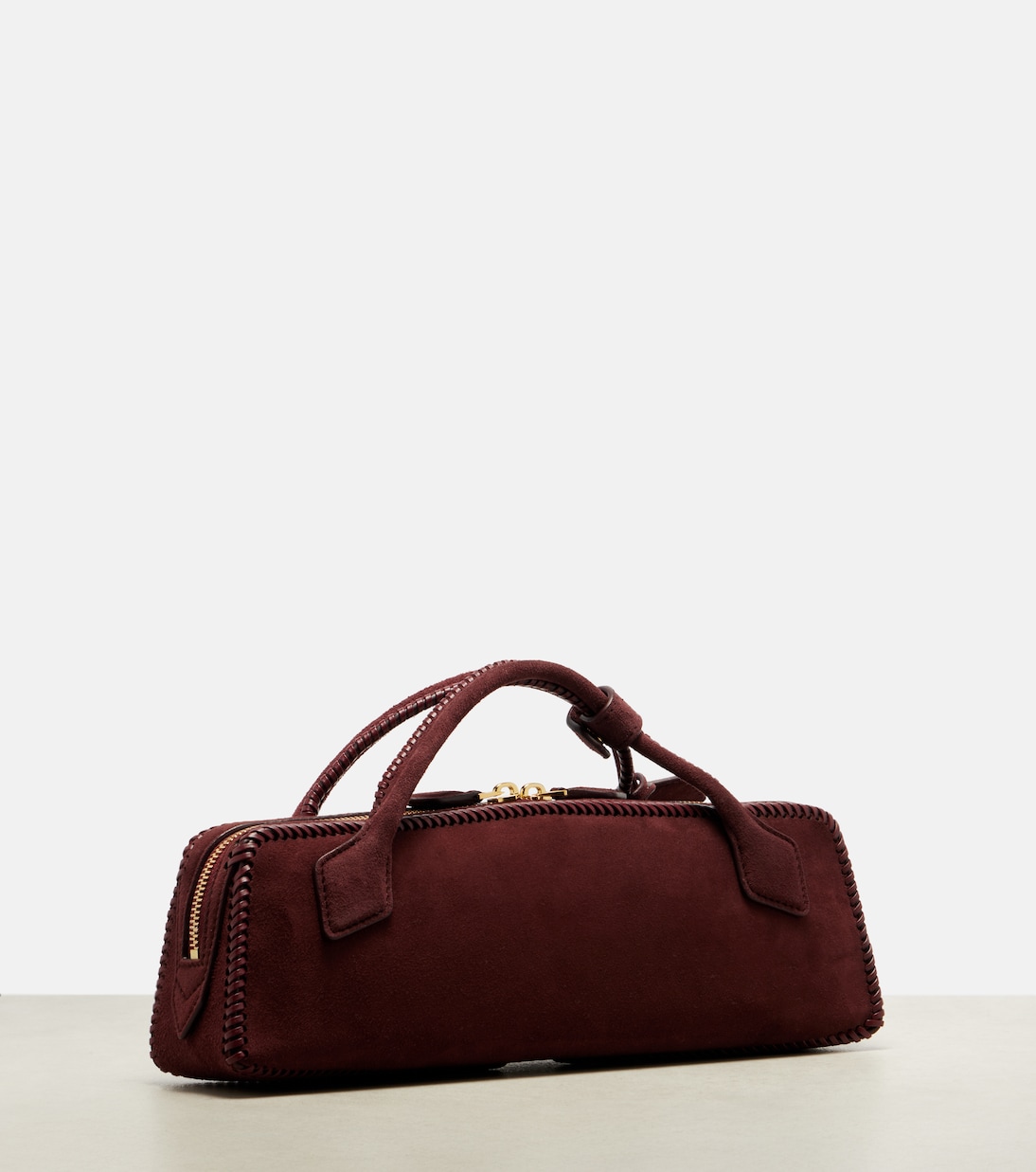 Le Teckel Small suede clutch | Alaïa