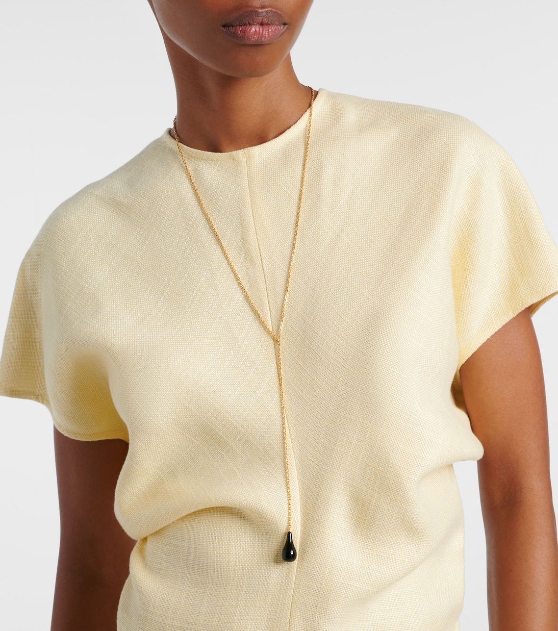 Collier en plaqué or et onyx | Toteme