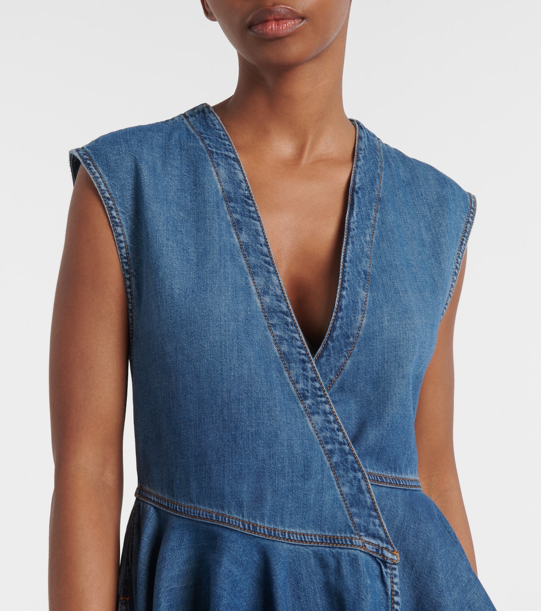 Asymmetric denim wrap dress | Alaïa