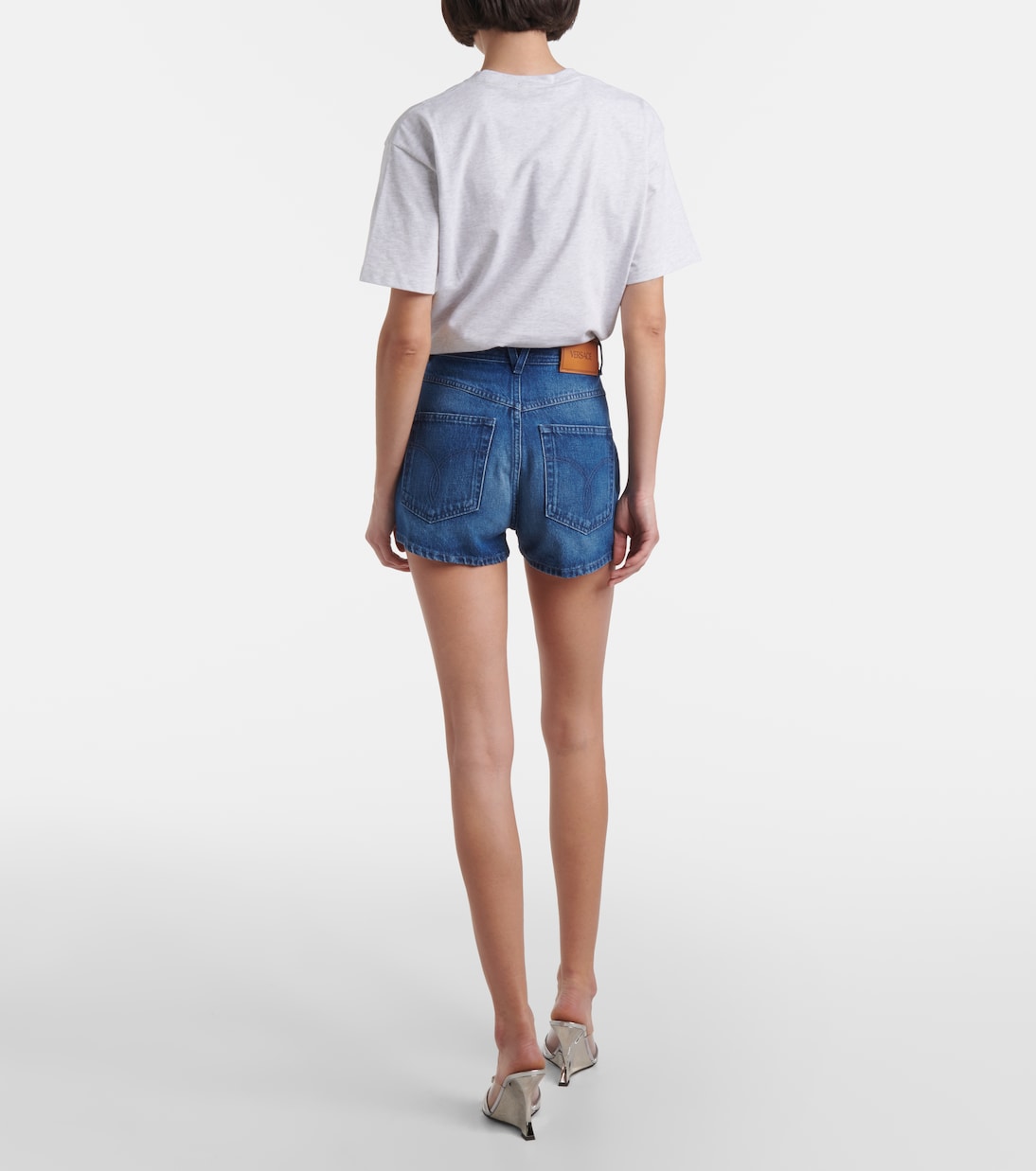 Shorts de denim con efecto desgastado | Versace