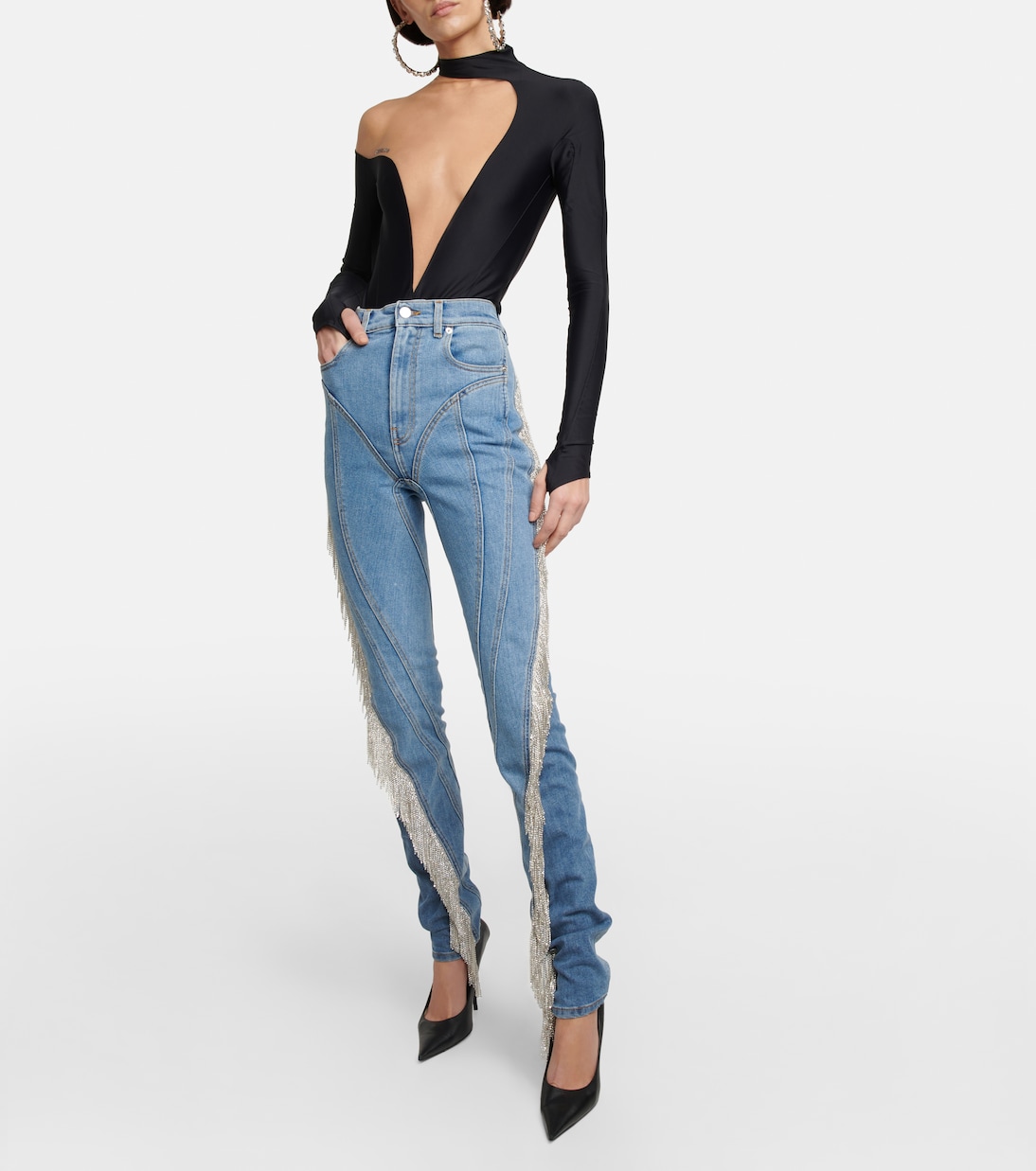 Spiral tassel-trimmed skinny jeans | Mugler