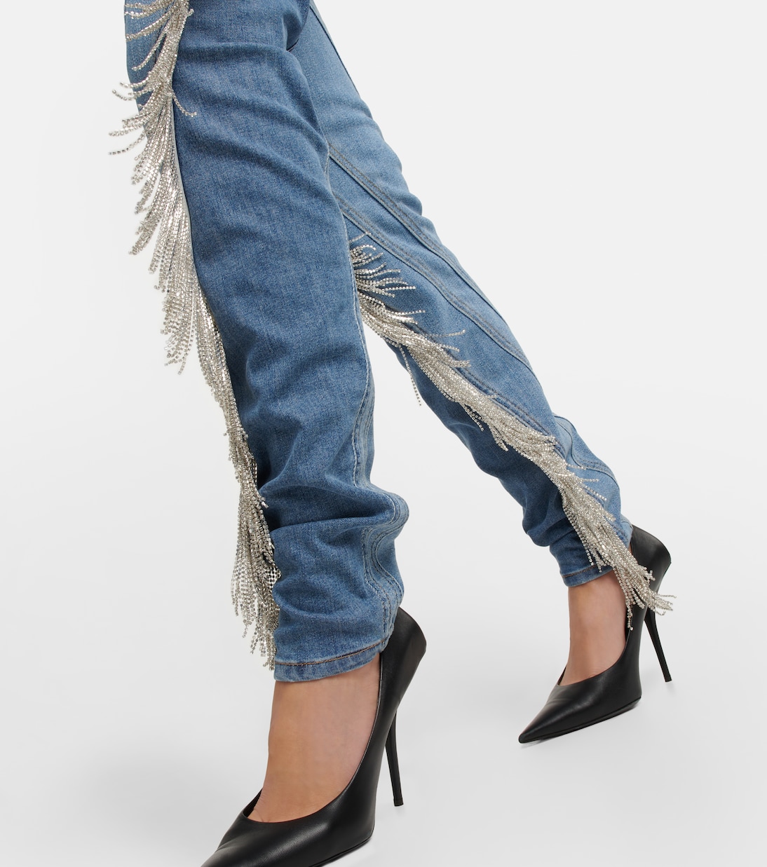 Spiral tassel-trimmed skinny jeans | Mugler