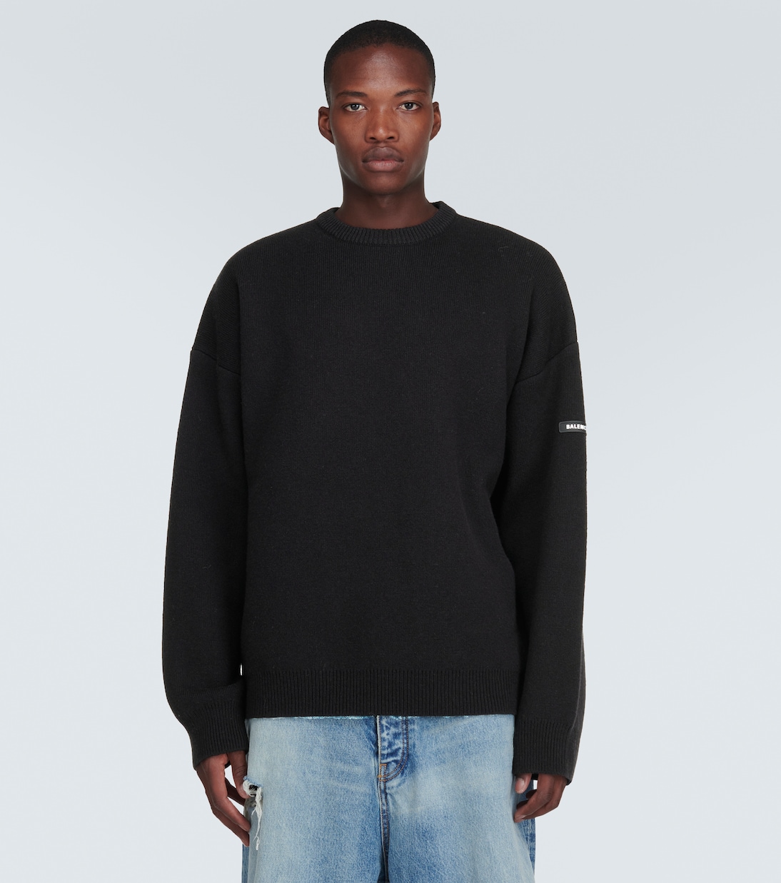 Oversized wool blend sweater in black Balenciaga Mytheresa