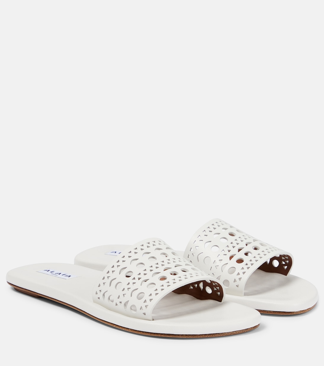 Laser-cut leather mules | Alaïa