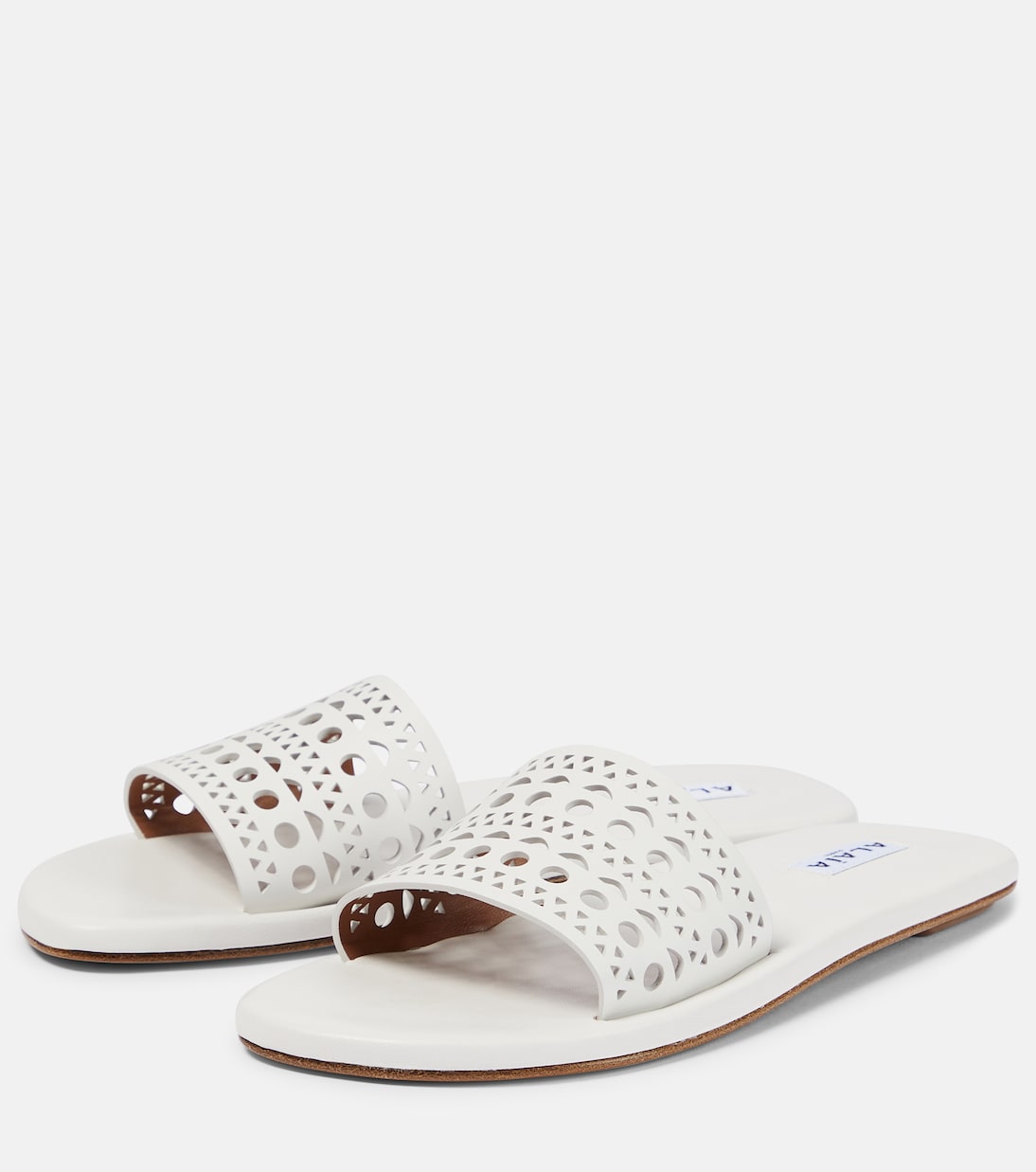Laser-cut leather mules | Alaïa