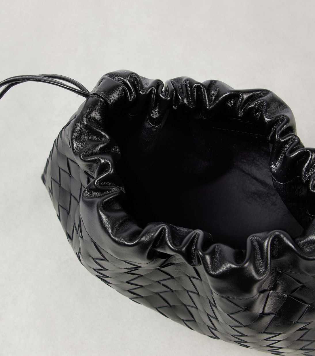 Pochette Dustbag en cuir intrecciato | Bottega Veneta