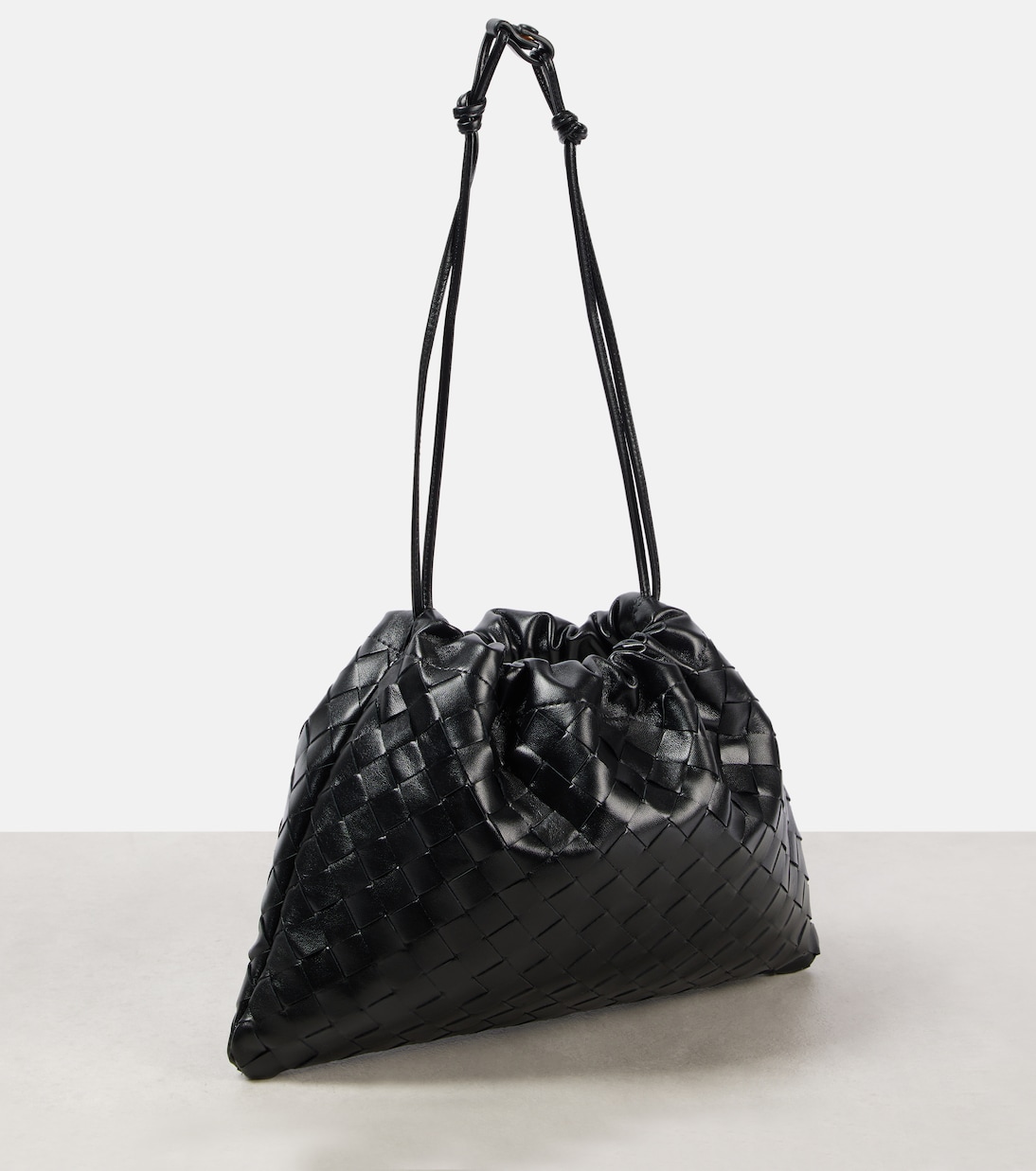 Pochette Dustbag en cuir intrecciato | Bottega Veneta