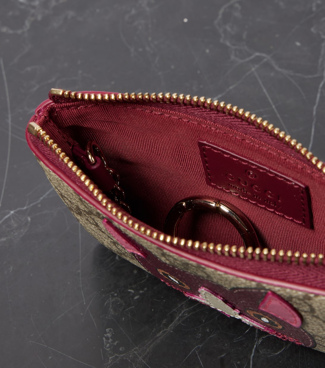 Portachiavi in pelle con stampa GG di GUCCI, accessorio trendy per giovani