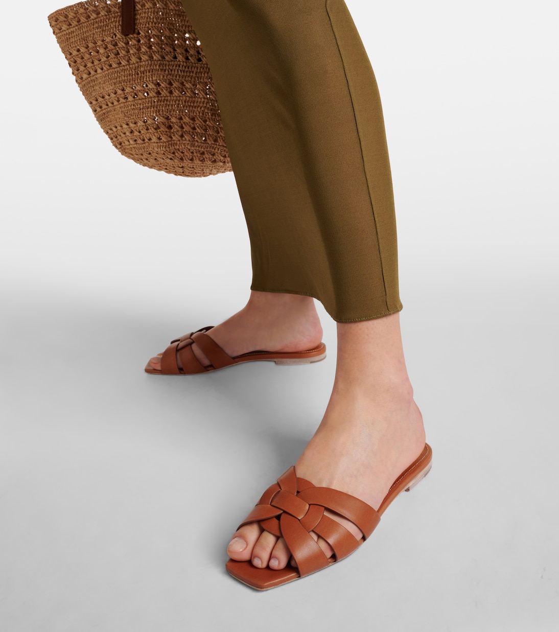 Tribute Nu Pieds 05 leather slides in brown Saint Laurent Mytheresa