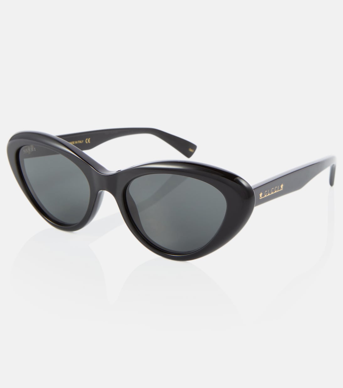 Occhiali da sole GUCCI con montatura a forma di gatto, stile giovanile e trendy.