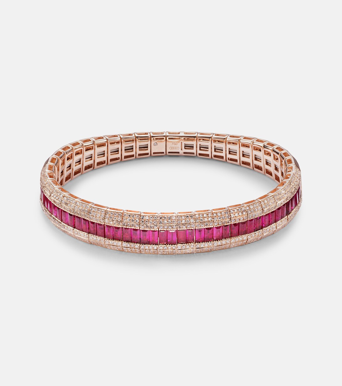 Bracciale in oro rosa 18kt con dettagli a scaglie, rubini e diamanti pavé, ideale per giovani trendy.