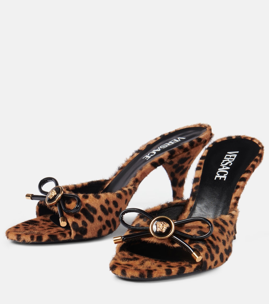 Mules Leopard Opera Bow 95 in shearling | Versace