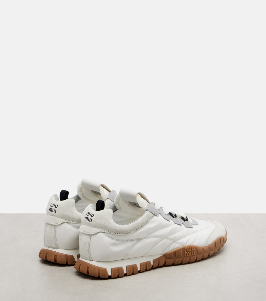 Tyre suede-trimmed sneakers | Miu Miu