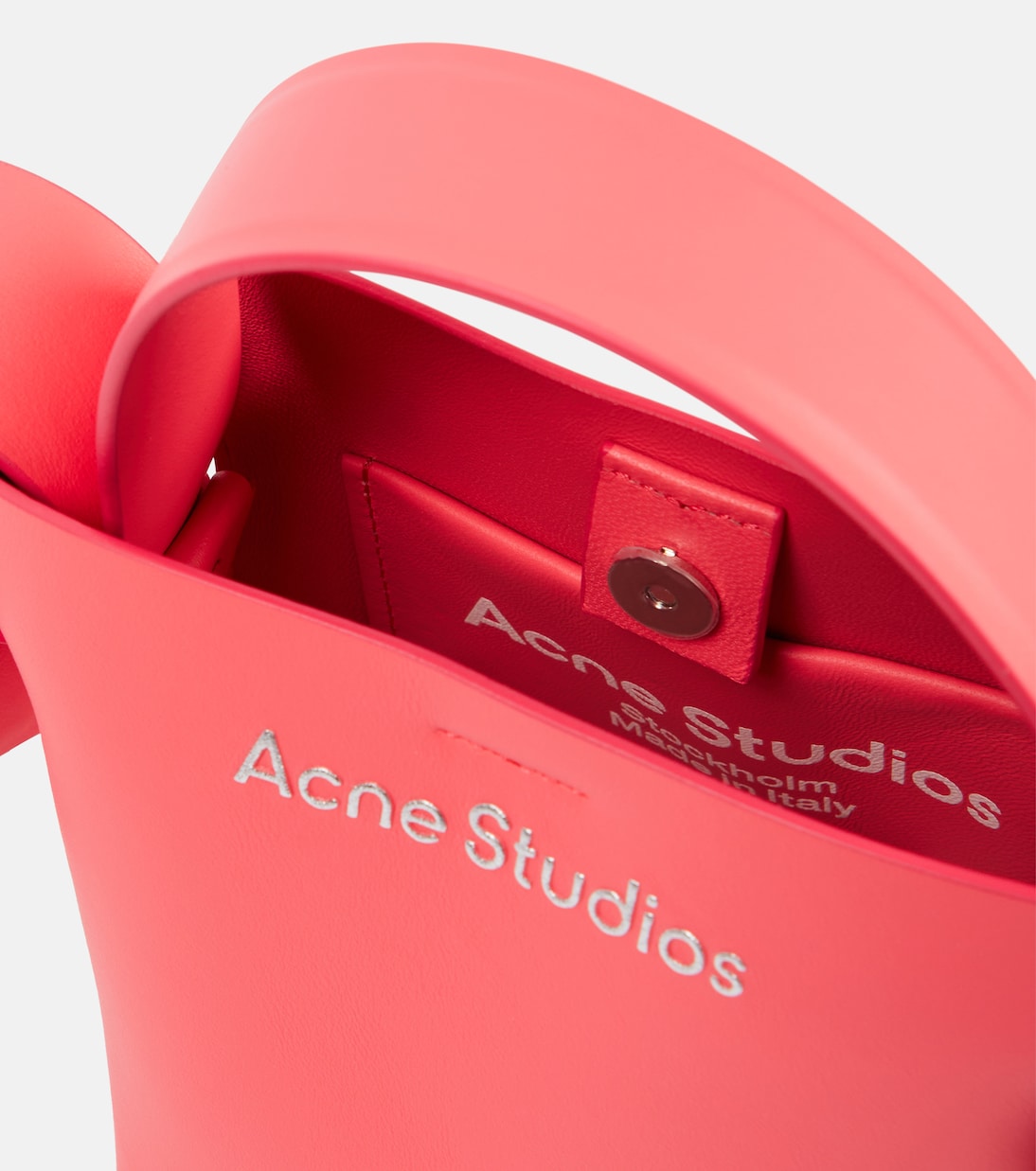 Musubi Mini leather crossbody bag in pink - Acne Studios