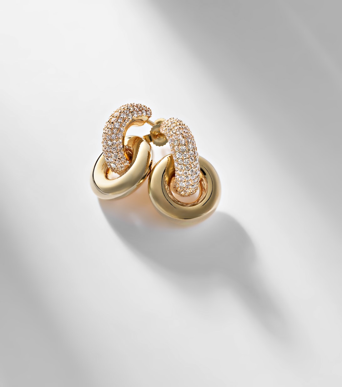 Buoy 14kt gold huggie earrings with diamonds | Stone and Strand