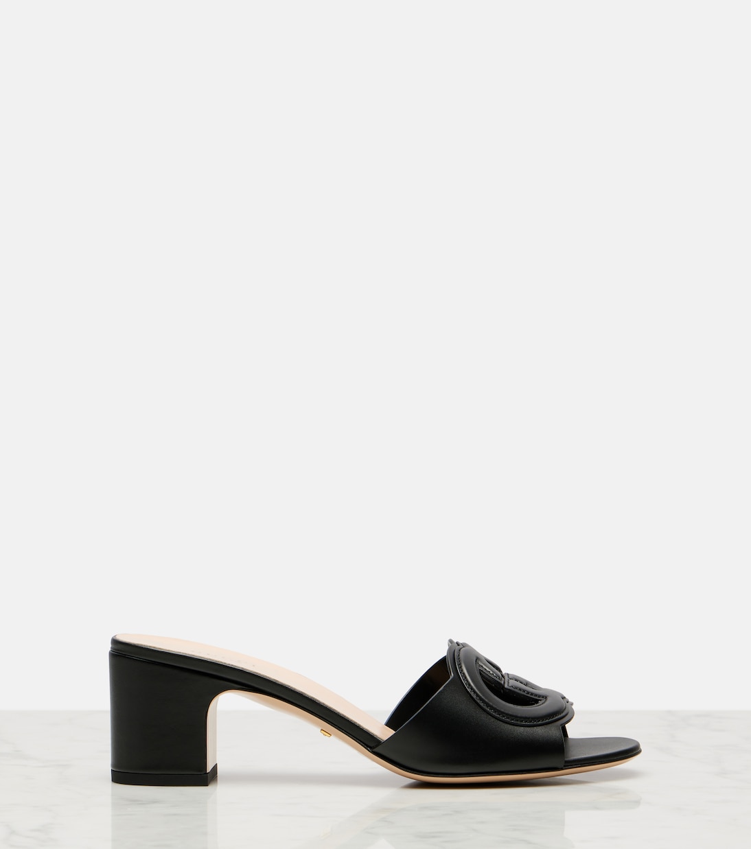 Pantoletten Interlocking G aus Leder | Gucci
