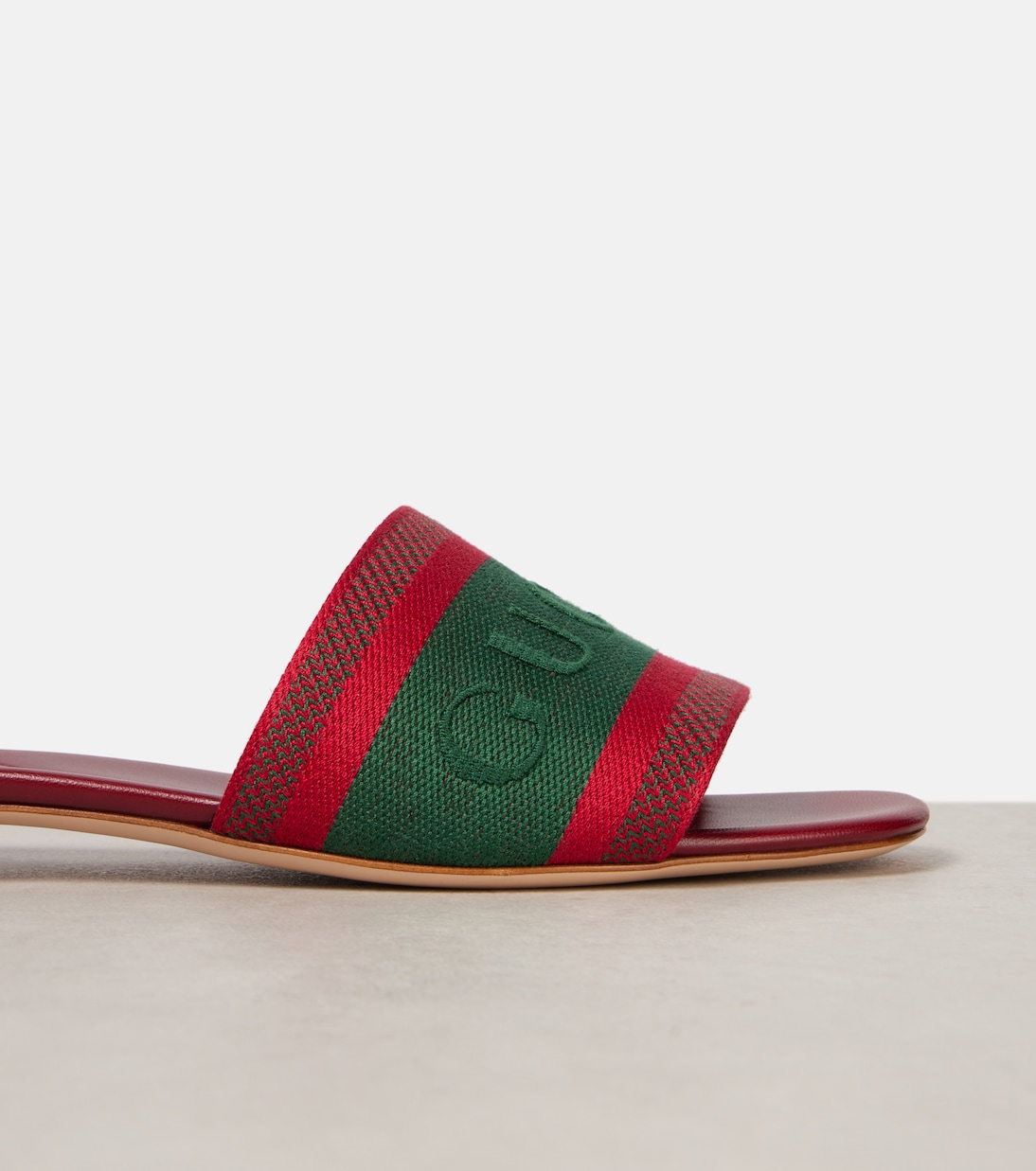 Web Stripe embroidered slides | Gucci