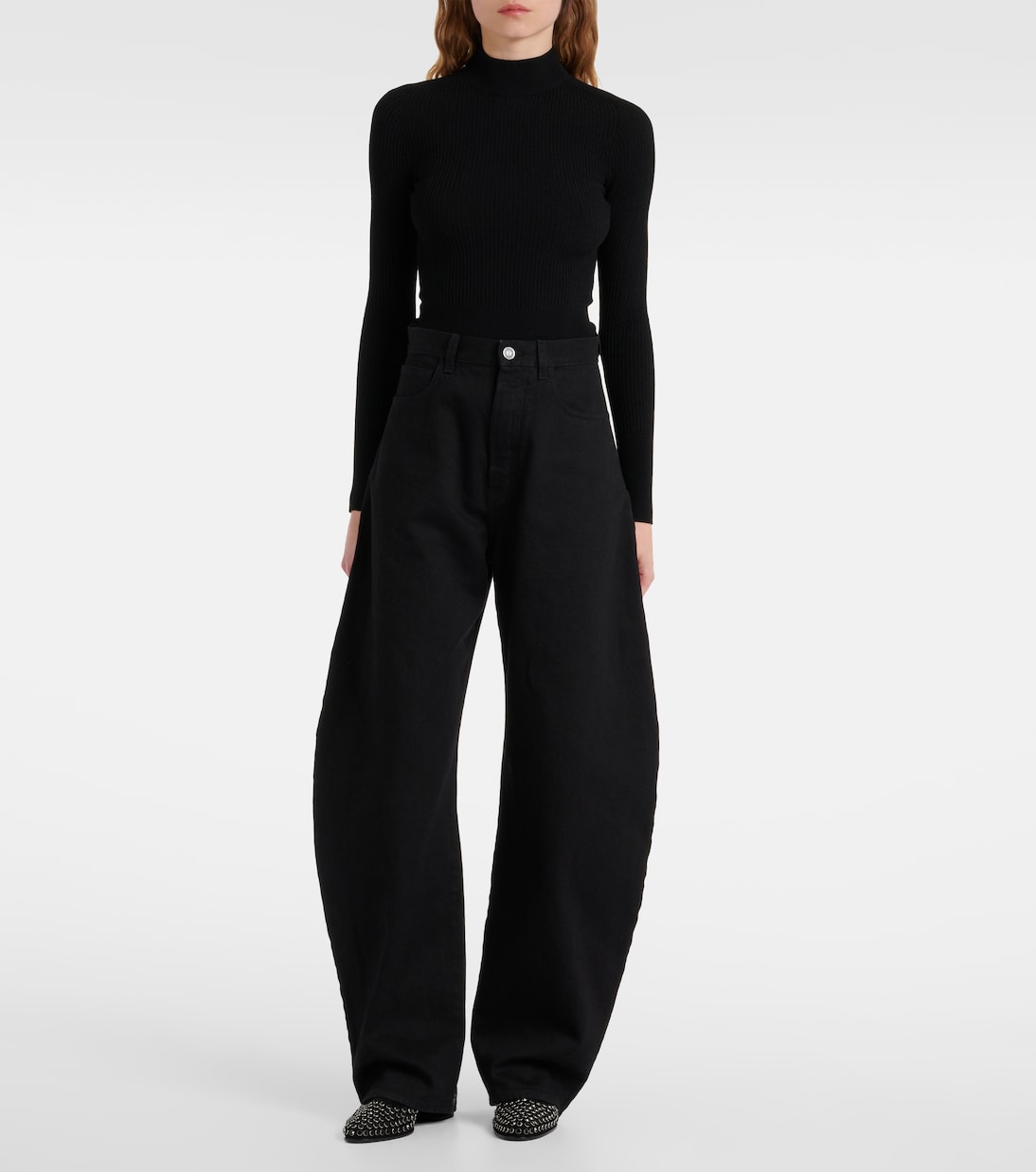 Stivaletti in pelle scamosciata con dettagli decorativi ALAÏA per uno stile giovane e audace