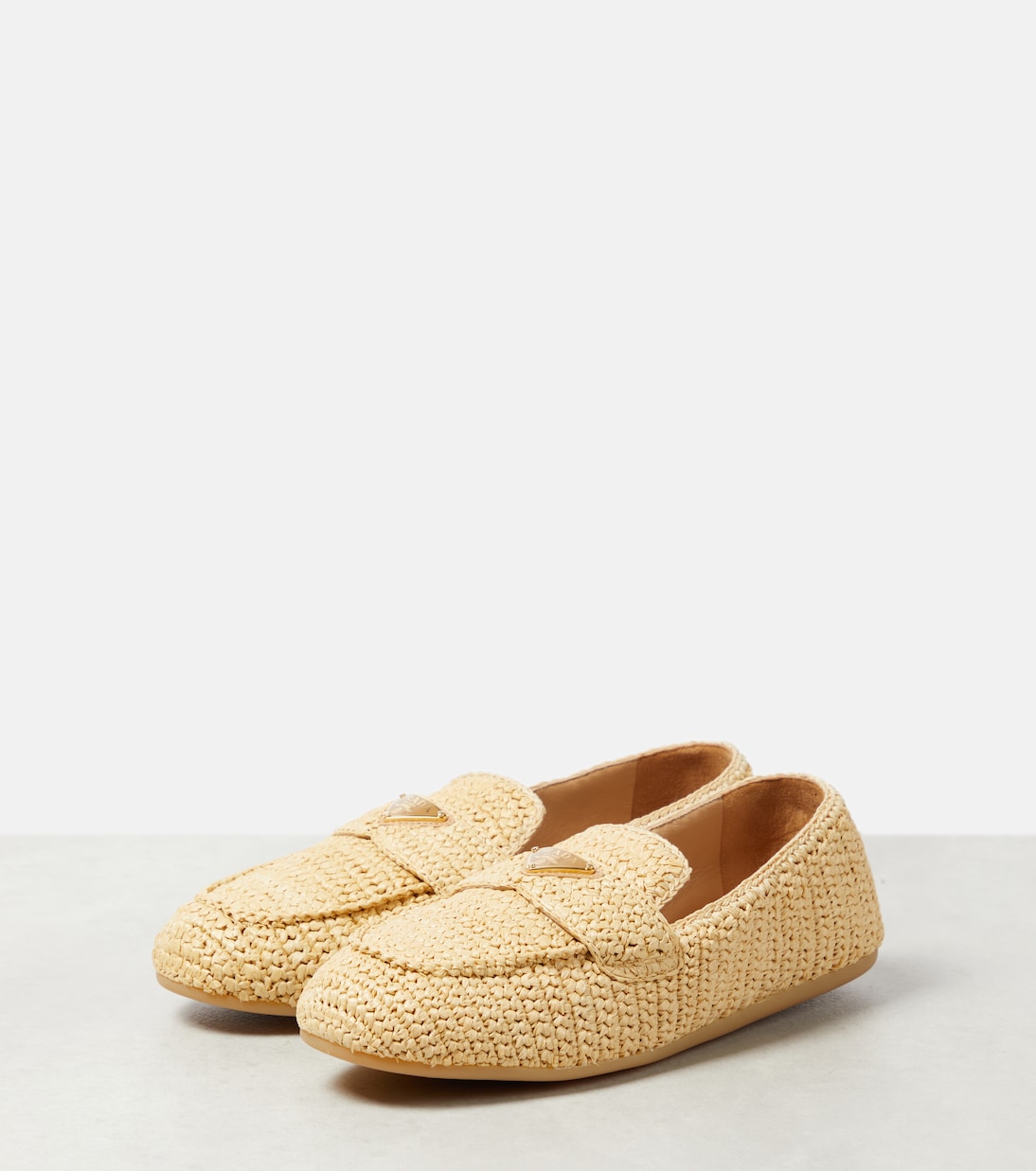 Woven raffia-effect loafers | Prada