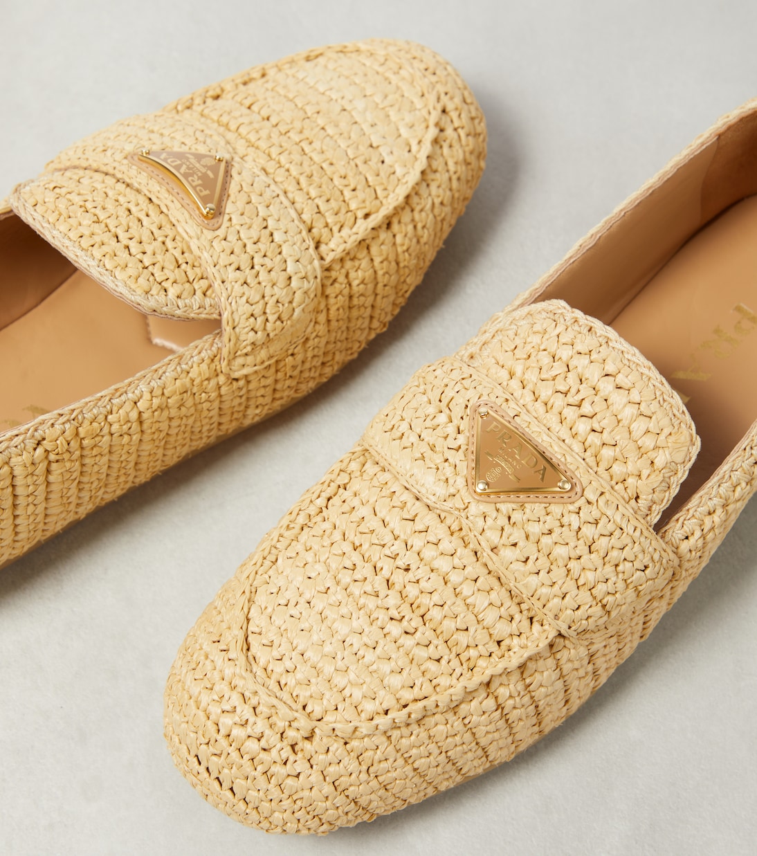 Woven raffia-effect loafers | Prada