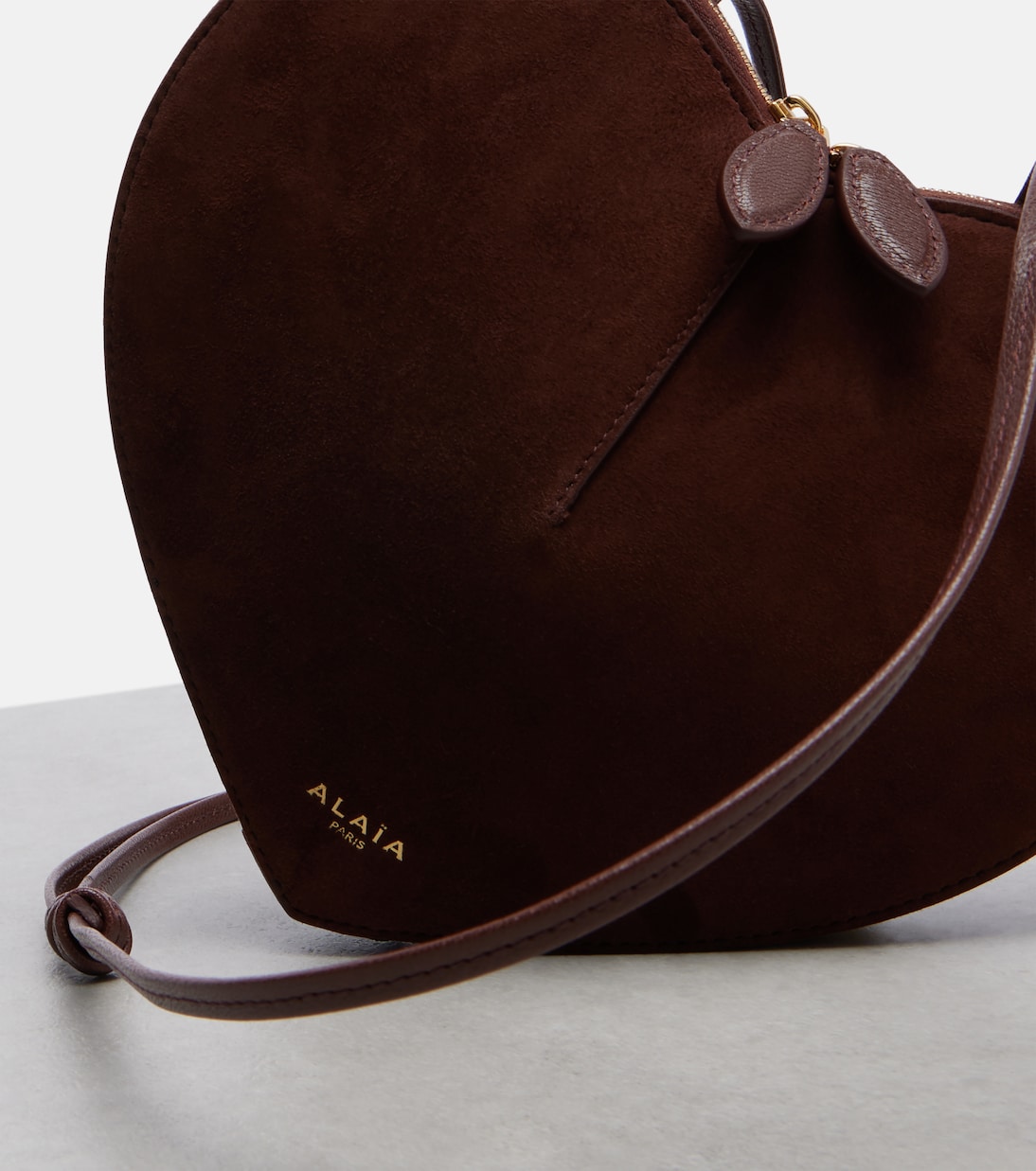 Le Cœur leather and suede shoulder bag | Alaïa