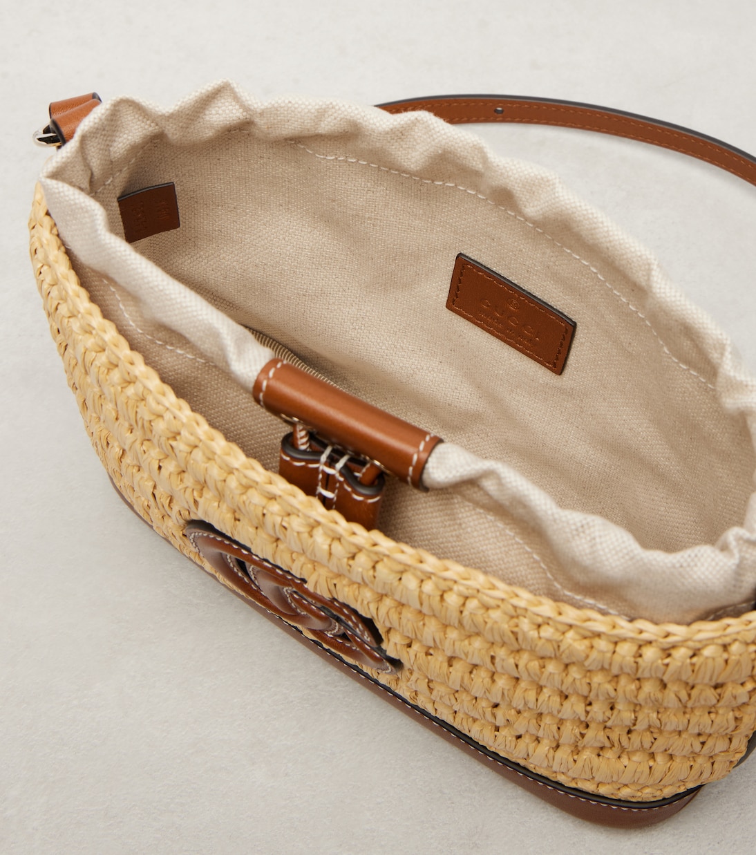 Woven leather-trimmed shoulder bag  | Gucci
