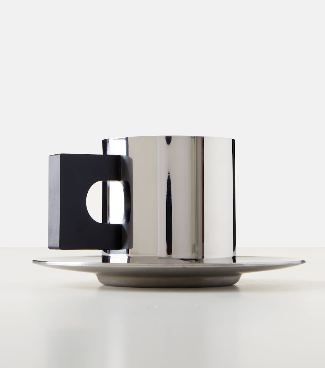 S.R. stainless steel cup and saucer set | Louise Roe