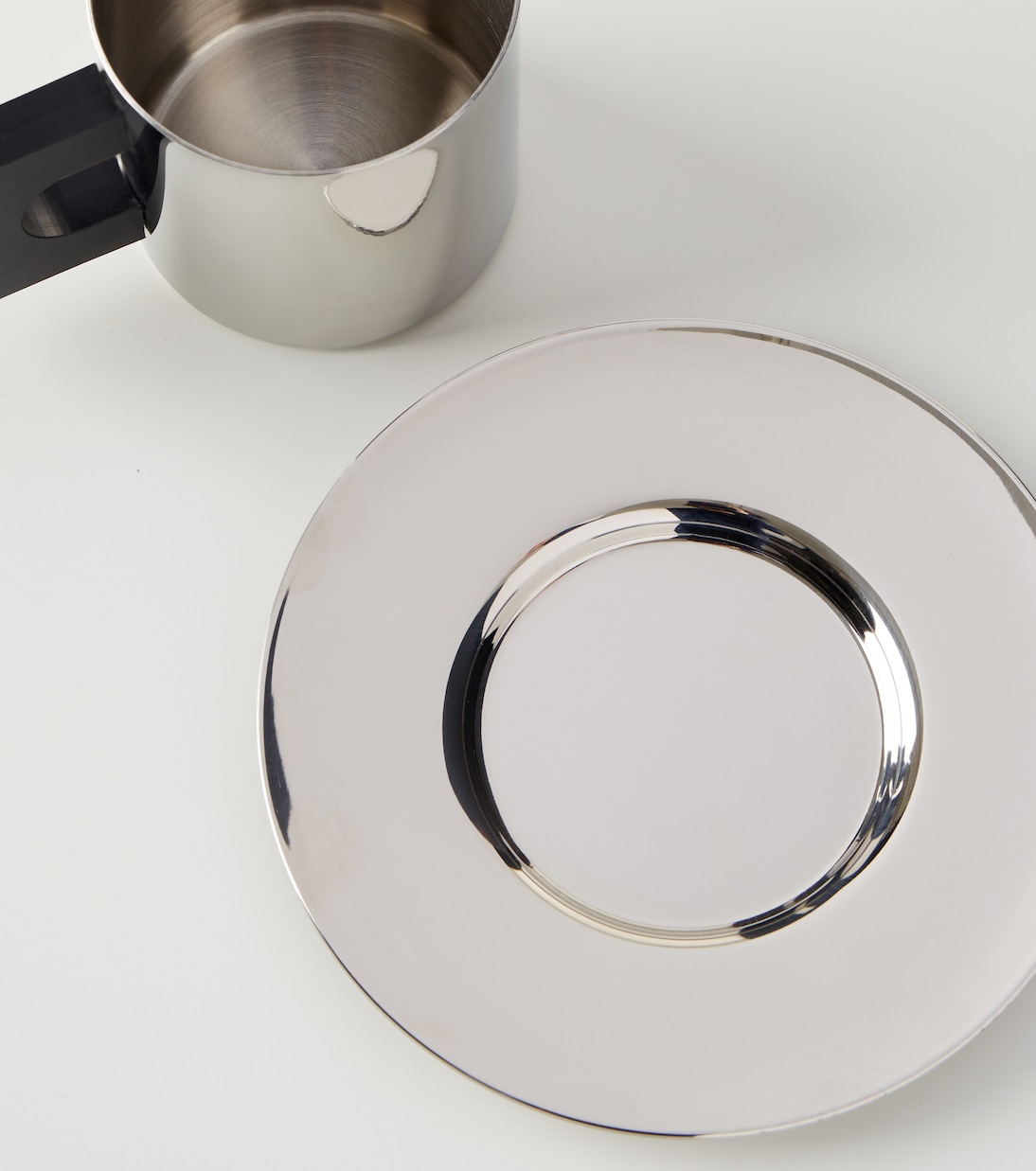 S.R. stainless steel cup and saucer set | Louise Roe