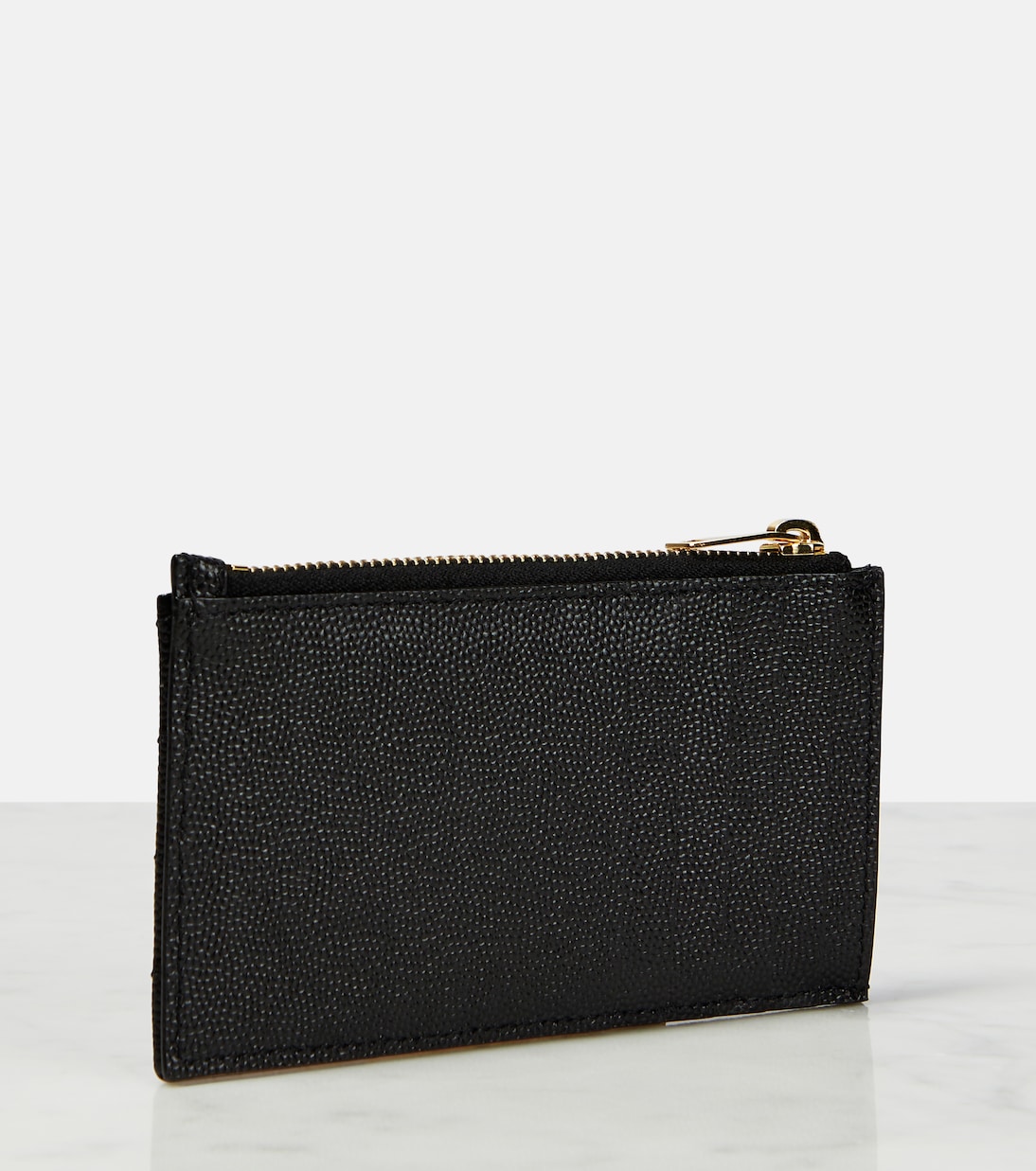 Portafoglio in pelle YSL con zip e monogramma, stile giovane e trendy
