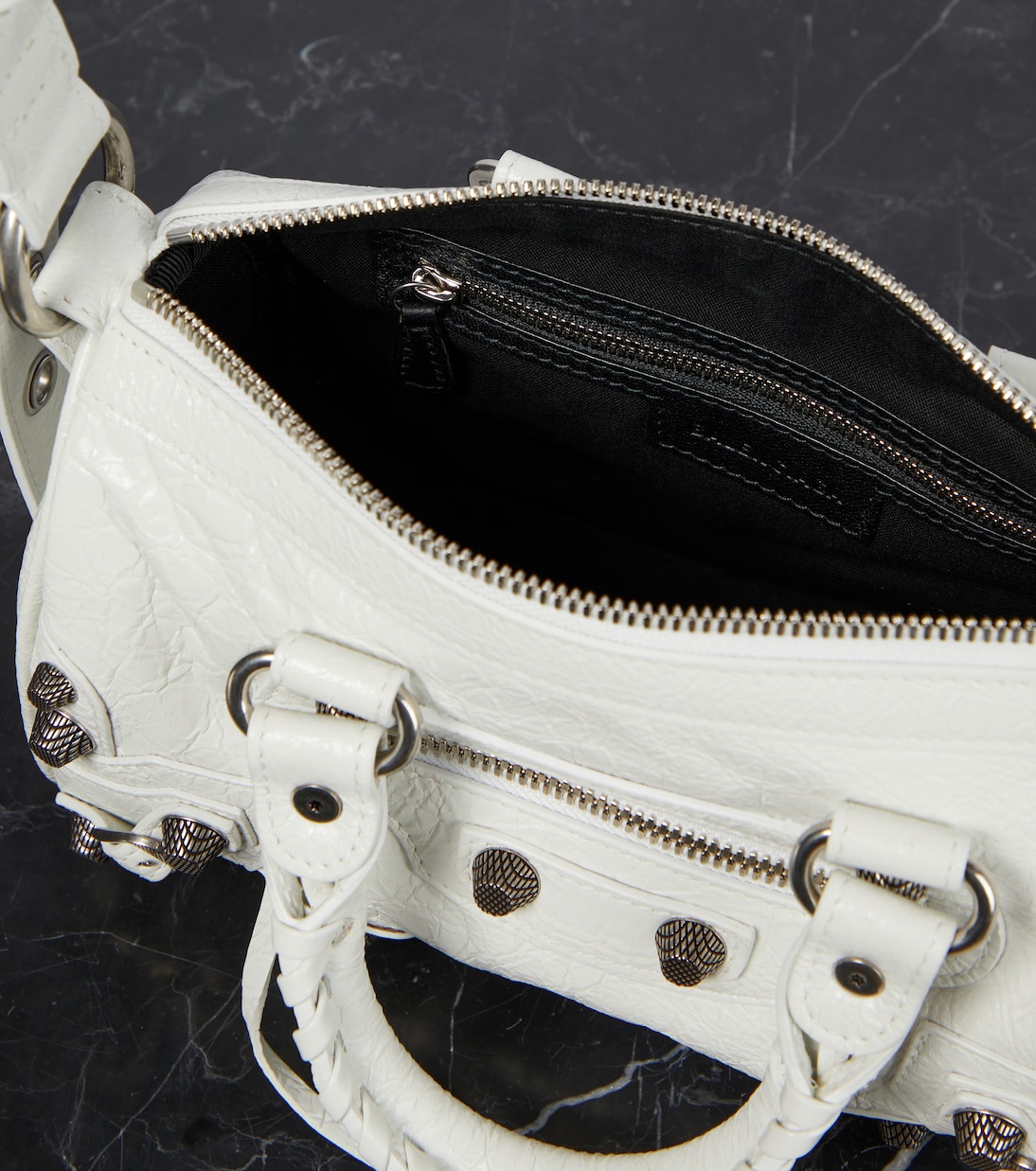 Le Cagole Mini leather duffel bag | Balenciaga