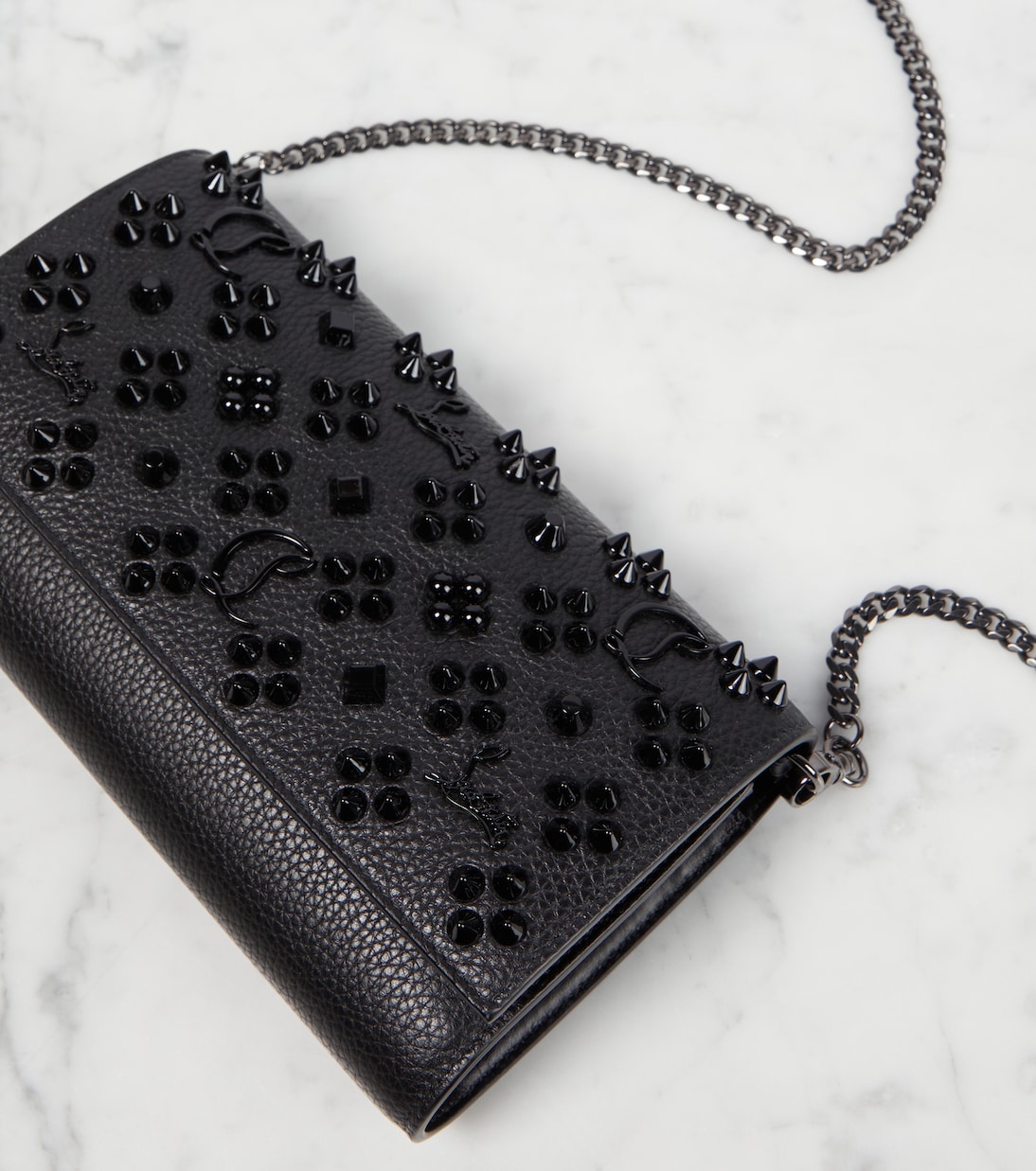 CLUTCH PALOMA IN PELLE CON DECORI DI CHRISTIAN LOUBOUTIN PER GIOVANI STILOSI