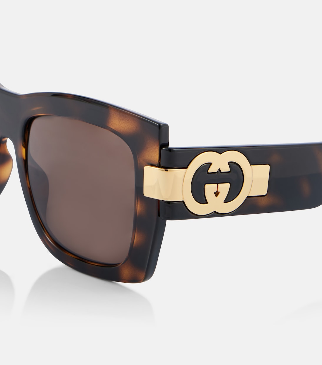 Occhiali da sole GUCCI con logo G quadrato intrecciato, stile giovane e trendy