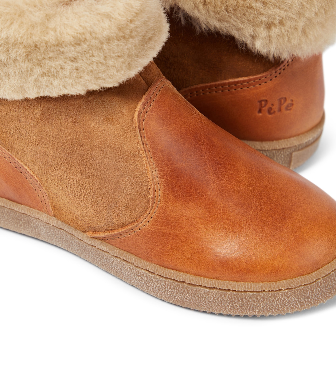 Shearling-trimmed leather and suede ankle boots | PèPè