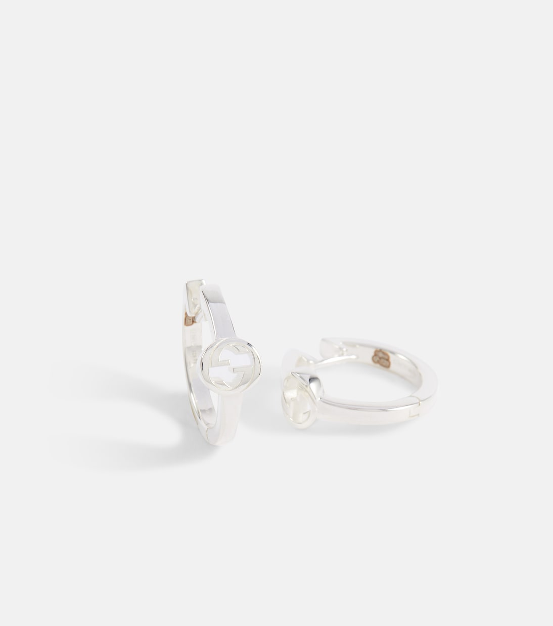 Orecchini a cerchio Interlocking G in argento sterling | Gucci