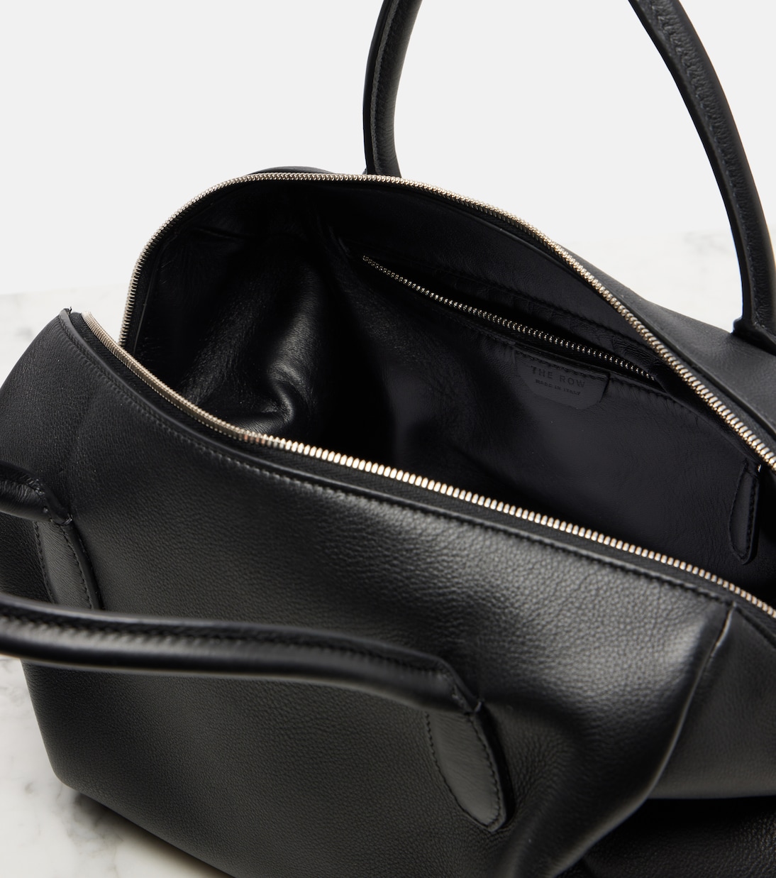 Faye leather top-handle bag | The Row