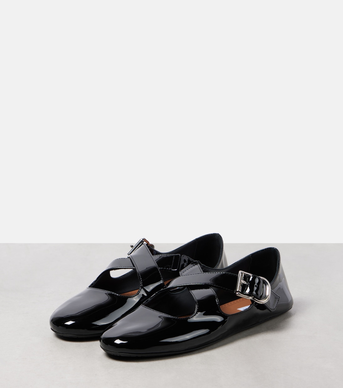 Ballerine Criss Cross in vernice | Alaïa