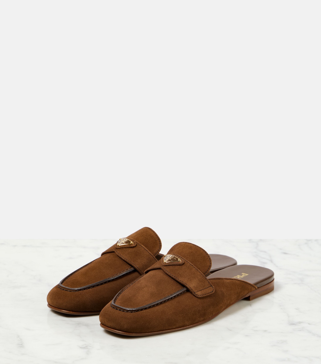 Mules in suede con logo | Prada