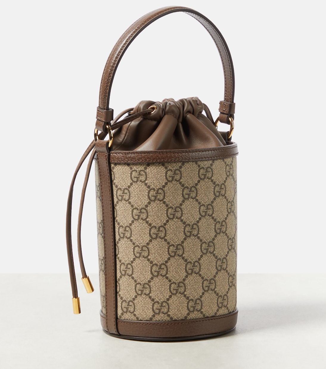 Ophidia GG Mini canvas bucket bag in brown Gucci Mytheresa