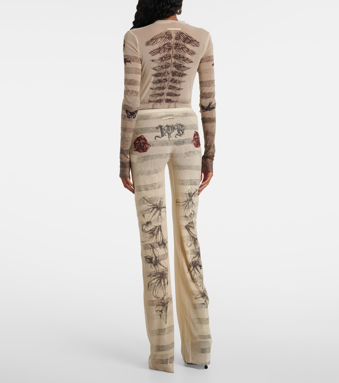 Trompe l’oeil mesh flared pants | Jean Paul Gaultier