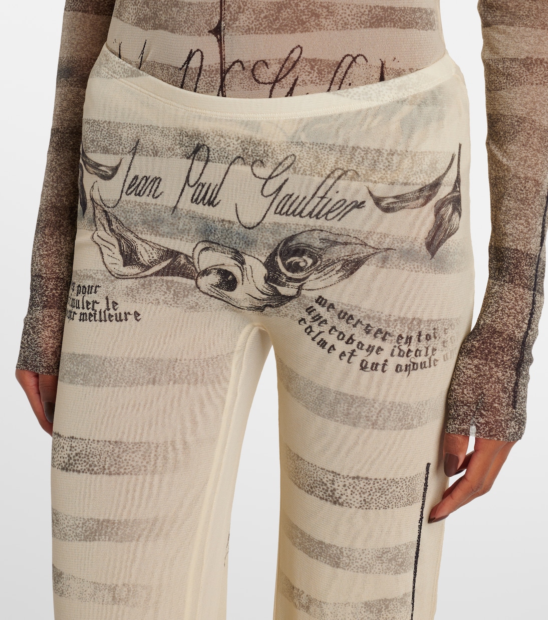 Trompe l’oeil mesh flared pants | Jean Paul Gaultier