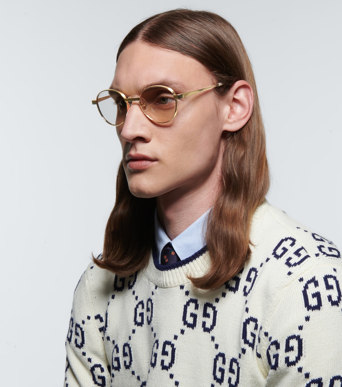 Round glasses in gold Gucci Mytheresa