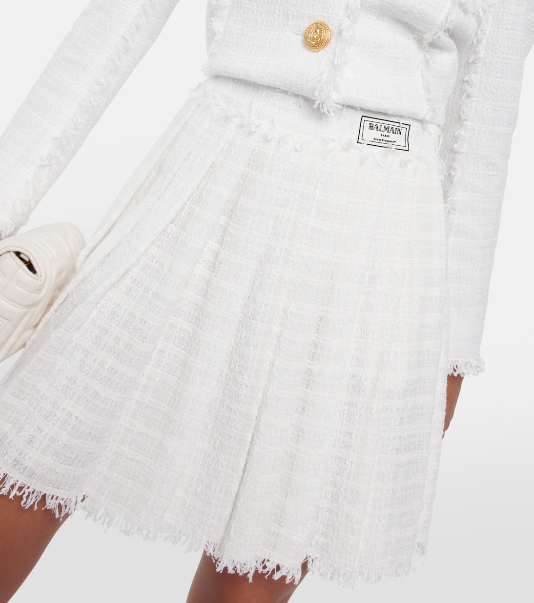 Minigonna a pieghe in tweed di misto cotone | Balmain