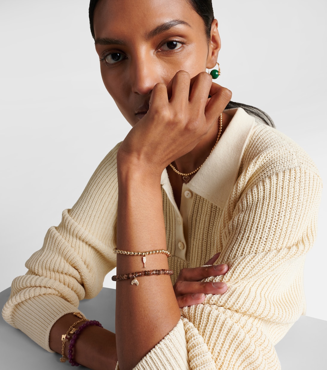 Bracciale giovane in oro 14kt con perline, andalusite e diamanti, stile croissant chic.