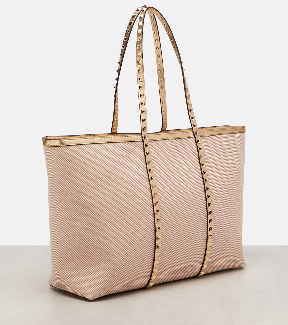 Rockstud Large leather and canvas tote bag | Valentino Garavani
