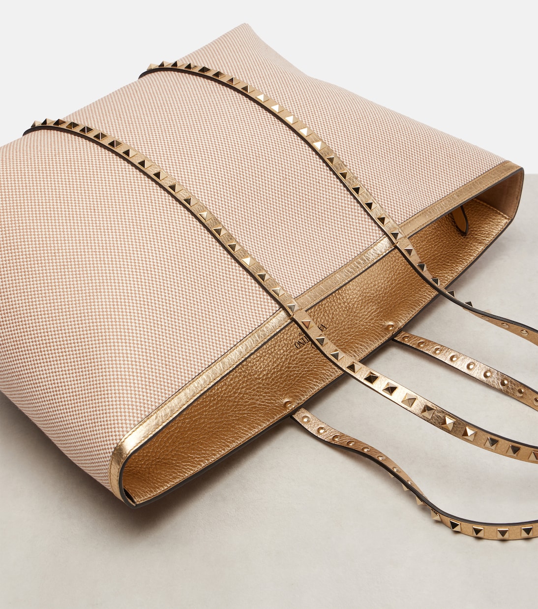 Rockstud Large leather and canvas tote bag | Valentino Garavani