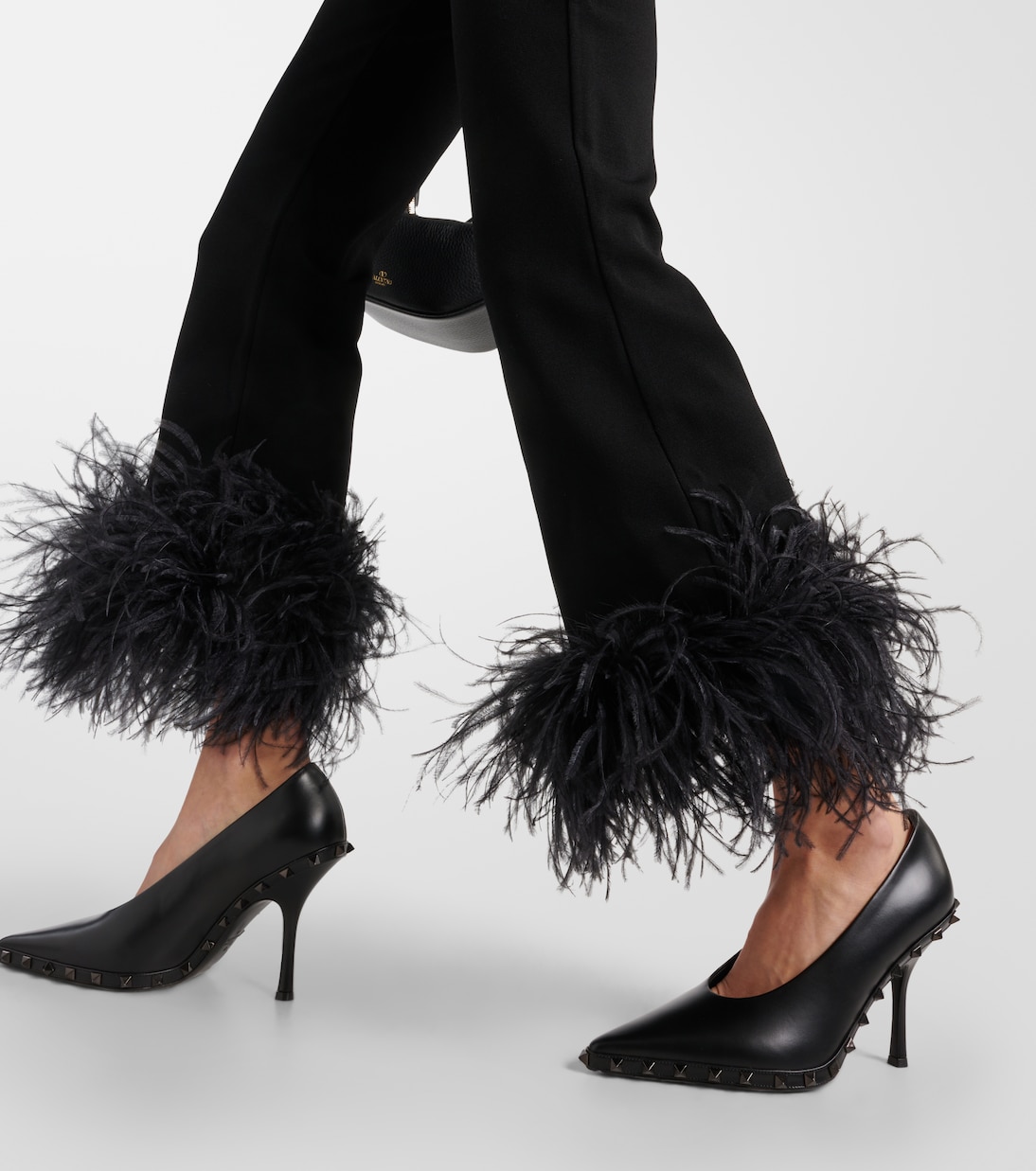Feather-trimmed high-rise flared pants | Valentino