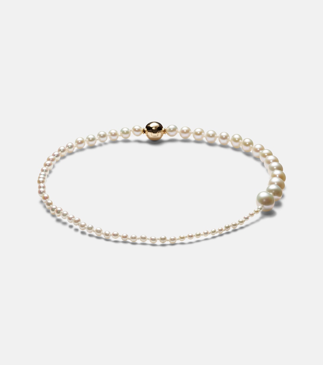 Braccialetto caviglia in oro 14kt con perle d'acqua dolce, stile giovane e raffinato, design unico e moderno.