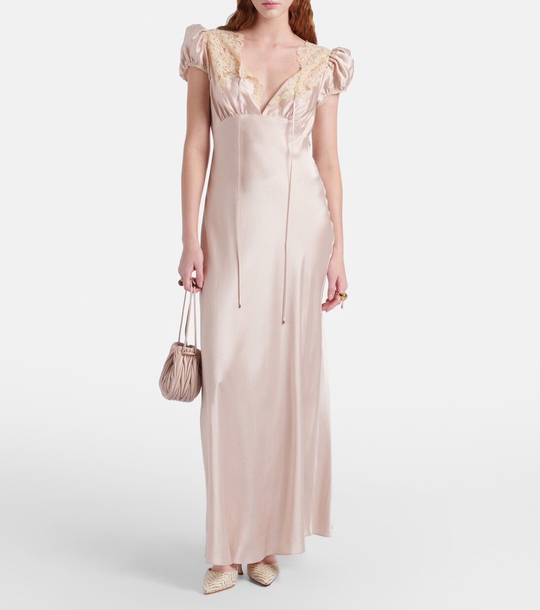 Carolyne leather-trimmed woven mules | Manolo Blahnik