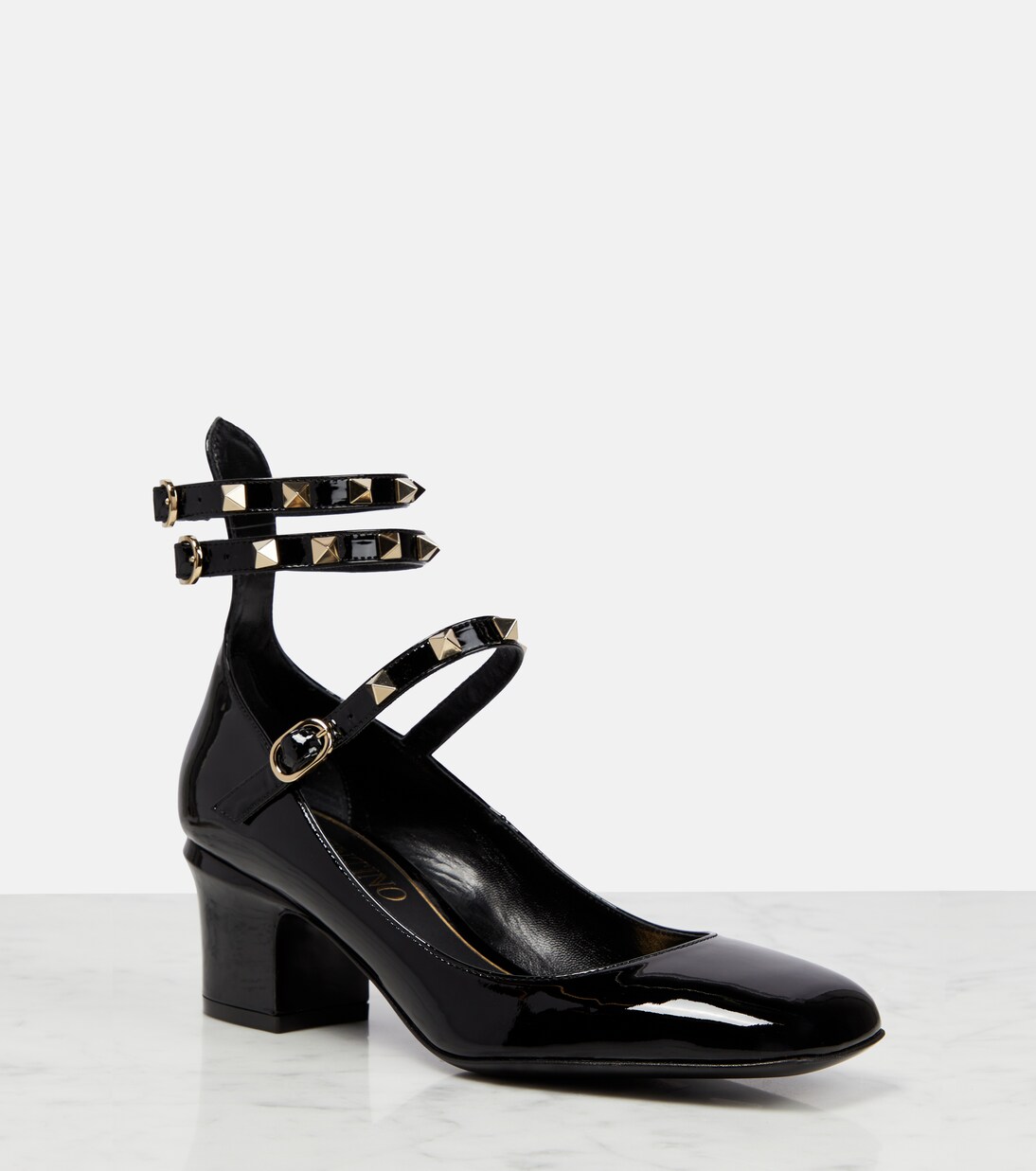 Rockstud patent leather pumps in black Valentino Garavani Mytheresa